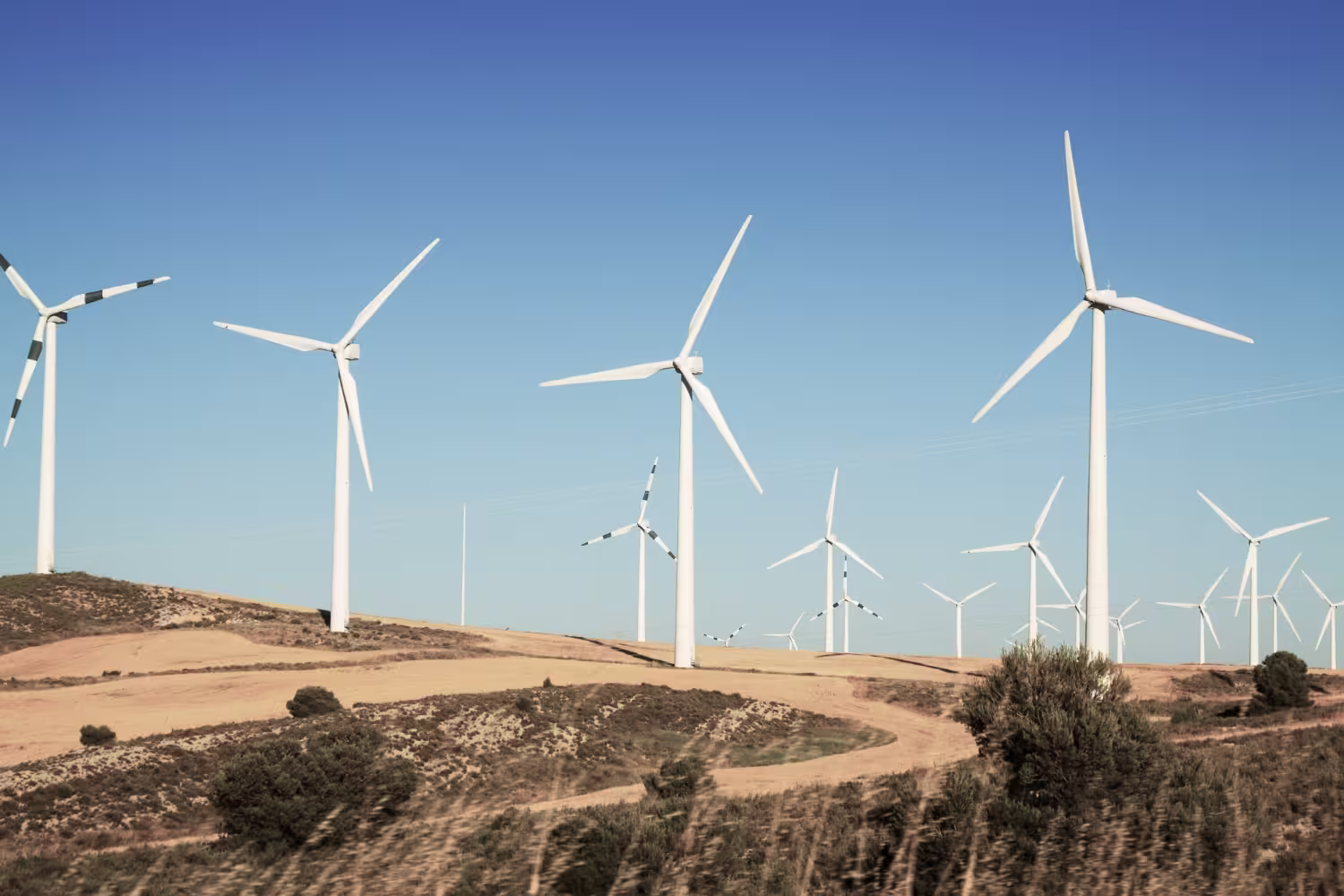 Wind turbines representing AI optimization in energy production and forecasting