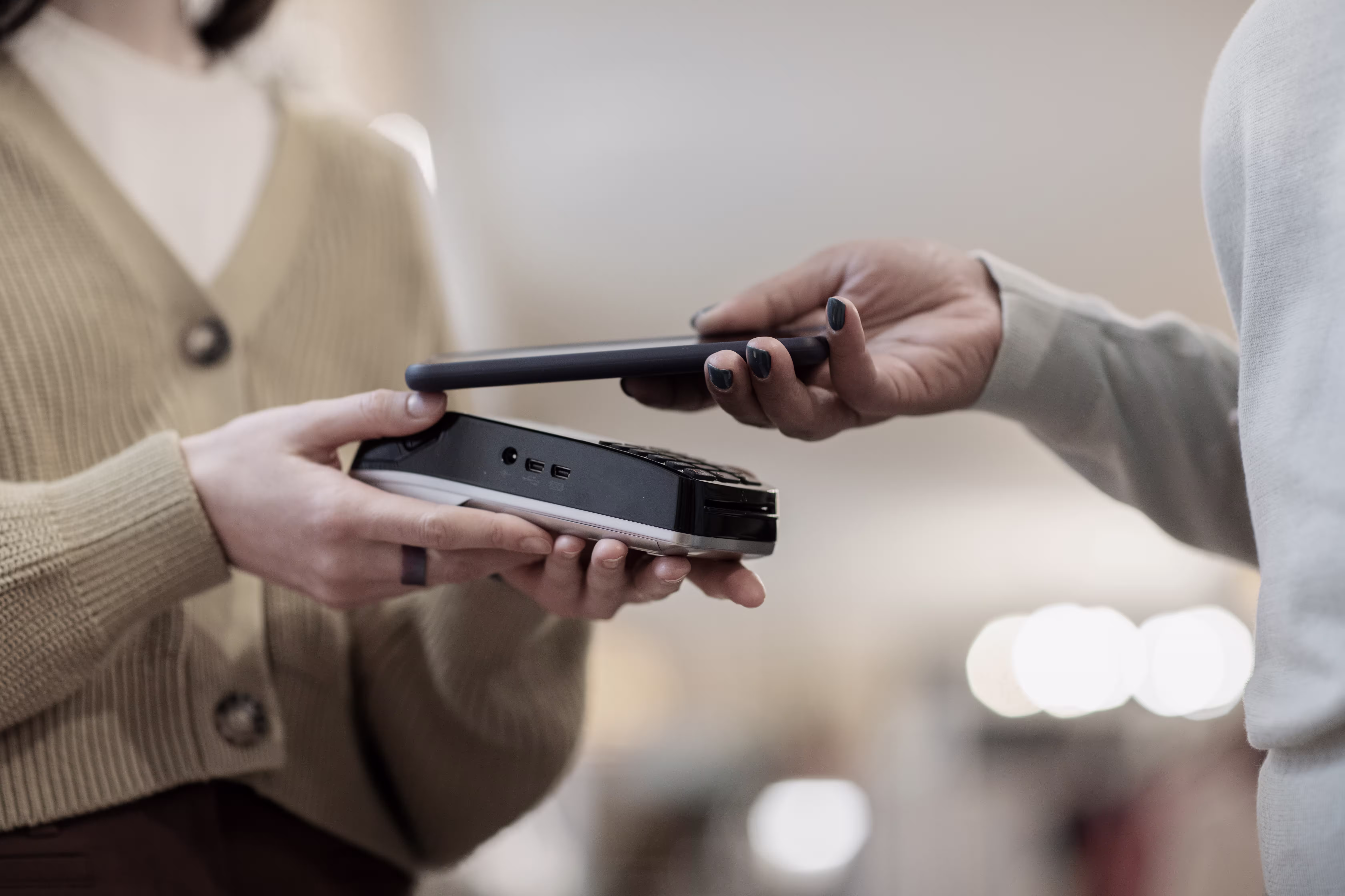 Contactless payment representing AI fraud detection in financial services